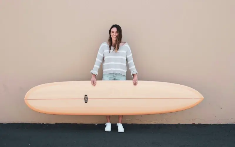 Girl with surfboard